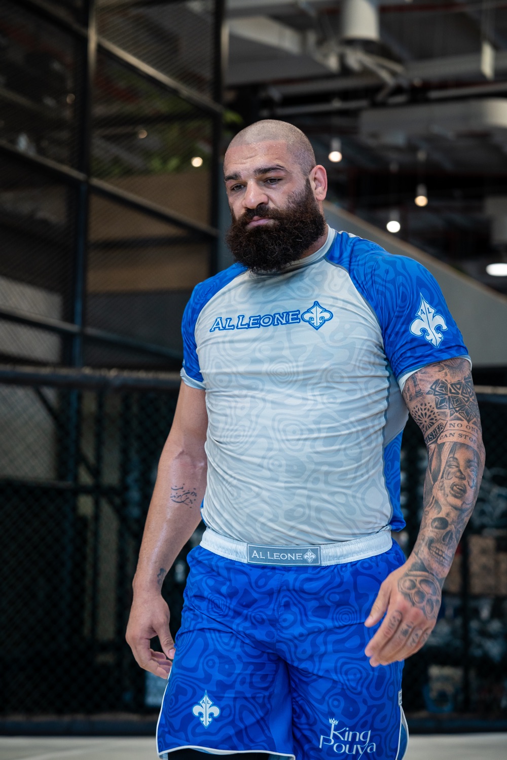 MMA fighter walking the cage, focused before the fight